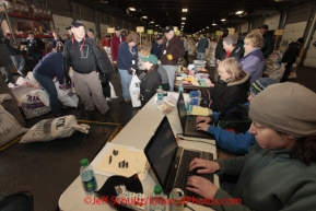 Wednesday February 15, 2012.  Iditarod volunteers prepare musher's 