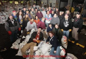 Wednesday February 15, 2012.  Iditarod volunteers pose for a group photo as they prepare musher's 