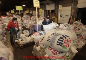 Wednesday February 15, 2012.  Iditarod volunteers prepare musher's 