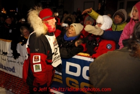 Aily Zirkle is greeted by race fans after arriving second in Nome on Tuesday March 12, 2013.Iditarod Sled Dog Race 2013Photo by Jeff Schultz copyright 2013 DO NOT REPRODUCE WITHOUT PERMISSION
