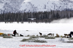 Tuesday March 6, 2012 An airplane takes off from Puntilla Lake as 