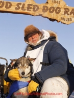 Sunday March 18, 2012    Dan Seavey, mushing to celebrate the 100th anniversary of the historic Iditarod Trail, poses with his lead dog 